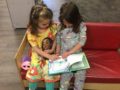 preschool_girls_reading_a_book_cadence_academy_algonquin-600x450