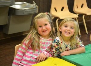 preschool_girls_smiling_at_cadence_academy_preschool_rogers_ar-616x450