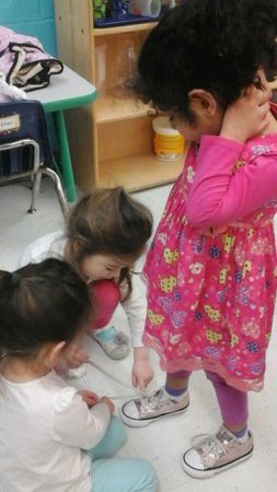 preschool_girls_tying_a_shoe_prime_time_early_learning_centers_hoboken_nj-253x450