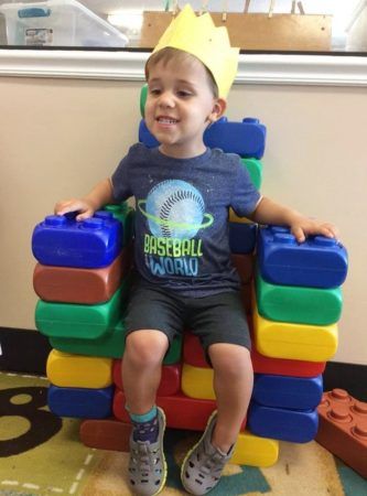 preschool_king_sitting_on_block_throne_cadence_academy_preschool_myrtle_beach_sc-333x450