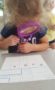 preschool_looking_at_fingerprints_through_magnifying_glass_fredericksburg_childrens_academy_fredericksburg_va-277x450