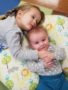 preschool_siblings_cuddling_winwood_childrens_center_ashburn_va-338x450