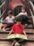 preschool_students_reading_on_playground_peachtree_park_prep_north_alpharetta_ga-337x450