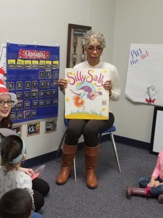 preschool_teacher_reading_silly_sally_cadence_academy_preschool_north_aurora_il-336x450