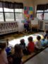 preschool_teacher_reading_to_students_cadence_academy_preschool_surfside_myrtle_beach_sc-338x450