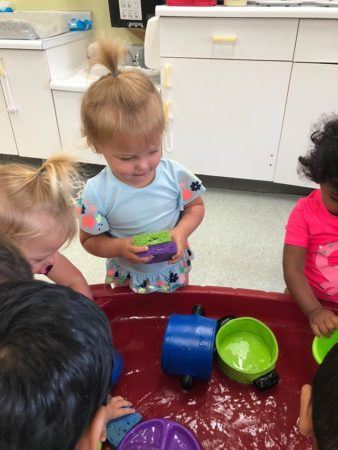 preschool_water_play_at_next_generation_childrens_centers_westborough_ma-338x450