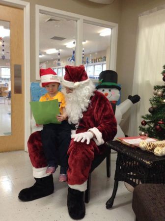 preschooler_and_santa_cadence_academy_raintree_charlotte_nc-336x450