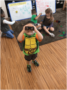 preschooler_in_ninja_turtle_shirt_cadence_academy_preschool_austin_cedar_park_tx-337x450
