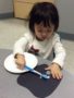 preschooler_learning_how_to_brush_teeth_cadence_academy_preschool_urbandale_ia-338x450