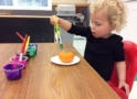 preschooler_painting_a_pumpkin_at_next_generation_childrens_centers_sudbury_ma-621x450