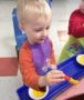 preschooler_painting_at_cadence_academy_preschool_myrtle_beach_sc-378x450