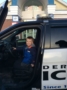 preschooler_posing_in_a_police_car_outside_next_generation_childrens_centers_andover_ma-333x450