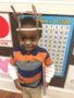 preschooler_with_reindeer_ears_sunbrook_academy_at_chapel_hill_douglasville_ga-338x450