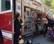 preschoolers_checking_out_fire_truck_cadence_academy_preschool_grand_west_des_moines_ia-548x450