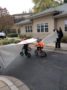 preschoolers_crashing_through_st_jude_trike-a-thon_banner_at_cadence_academy_preschool_columbine_littleton_co-333x450