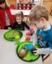 preschoolers_doing_colored_liquid_science_activity-cadence_academy_preschool_portland_or-372x450