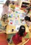 preschoolers_doing_letter_art_activity_carolina_kids_child_development_center_fort_mill_sc-313x450