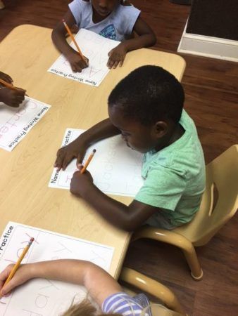 preschoolers_doing_name_writing_practice_sunbrook_academy_at_bay_springs_villa_rica_ga-338x450