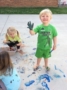 preschoolers_enjoying_outdoor_painting_activity_toddlers_enjoying_halloween_cadence_academy_preschool_greensboro_nc-335x450