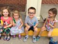 preschoolers_enjoying_popsicles_outside_cadence_academy_preschool_ashworth_west_des_moines_ia-602x450