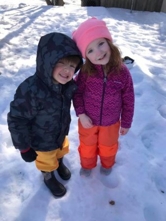 preschoolers_enjoying_the_snow_cadence_academy_preschool_grand_west_des_moines_ia-338x450