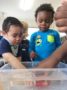 preschoolers_enjoying_water_play_at_cadence_academy_preschool_northeast_columbia_sc-336x450