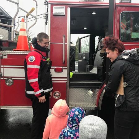 preschoolers_going_on_tour_of_a_fire_truck_cadence_academy_preschool_milwaukie_portland_or-450x450