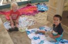 preschoolers_in_sand_area_on_roof_at_outdoor_balloon_project_at_cadence_academy_preschool_i_street_sacramento_ca-696x450
