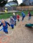 preschoolers_jumping_from_hoop_to_hoop_cadence_academy_preschool_yelm_2_olympia_wa-338x450