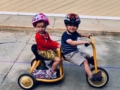 preschoolers_on_2_seat_tricycle_cadence_academy_preschool_grand_west_des_moines_ia-600x450
