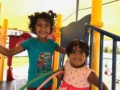 preschoolers_on_playground_structure_winwood_childrens_center_brambleton_ii_va-600x450