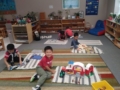 preschoolers_playing_with_toys_separately_smaller_scholars_montessori_academy_grisby_tx-600x450