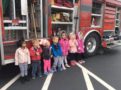 preschoolers_posing_in_front_of_cadence_academy_ofallon_mo-603x450