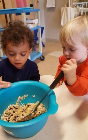 preschoolers_preparing_healthy_snack_cadence_academy_preschool_milwaukie_portland_or-284x450