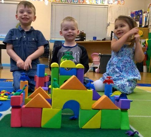 preschoolers_proud_of_their_block_castle_miss_muffets_learning_center-495x450