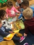 preschoolers_reading_a_book_bearfoot_lodge_private_school_wylie_tx-338x450