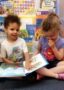 preschoolers_reading_a_book_winwood_childrens_center_gainesville_va-321x450