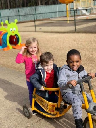 preschoolers_riding_a_tricycle_sunbrook_academy_at_legacy_park-338x450