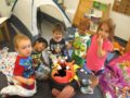 preschoolers_roasting_marshmallows_over_indoor_campfire_adventures_in_learning_aurora_il-600x450