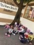 preschoolers_sitting_next_to_painted_tree_cadence_academy_preschool_san_antonio_tx-338x450