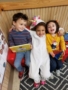 preschoolers_squeezed_onto_small_red_couch_cadence_academy_preschool_portland_or-338x450