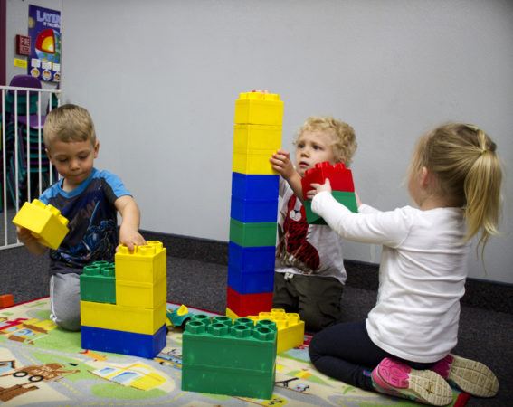 preschoolers_stacking_blocks_rogys_learning_place_east_peoria_il-567x450