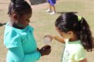 preschoolers_watering_plant_sunbrook_academy_at_stilesboro_kennesaw_ga-675x450