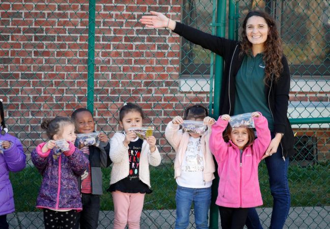 preschoolers_with_teacher_science_project_cadence_academy_north_aurora_il-648x450