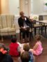 reading_to_preschool_children_at_cadence_academy_preschool_allen_tx-338x450