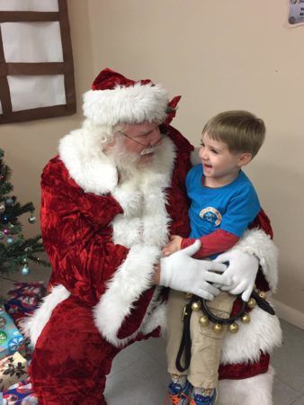santa_and_preschool_boy_at_cadence_academy_preschool_ken_caryl_littleton_co-338x450