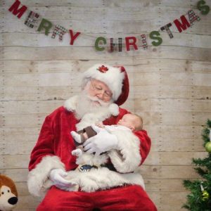 santa_napping_with_infant_winwood_childrens_center_leesburg_va-450x450