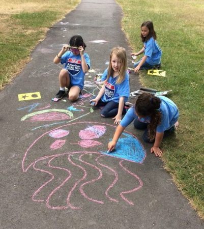 school_age_children_chalk_drawings_cadence_academy_preschool_sleater-kinney_olympia_wa-401x450