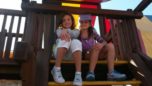 school_age_girls_on_playground_equipment_cadence_academy_preschool_allen_tx-752x423