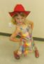 silly_preschool_girl_in_red_hat_cadence_academy_preschool_centennial_co-316x450